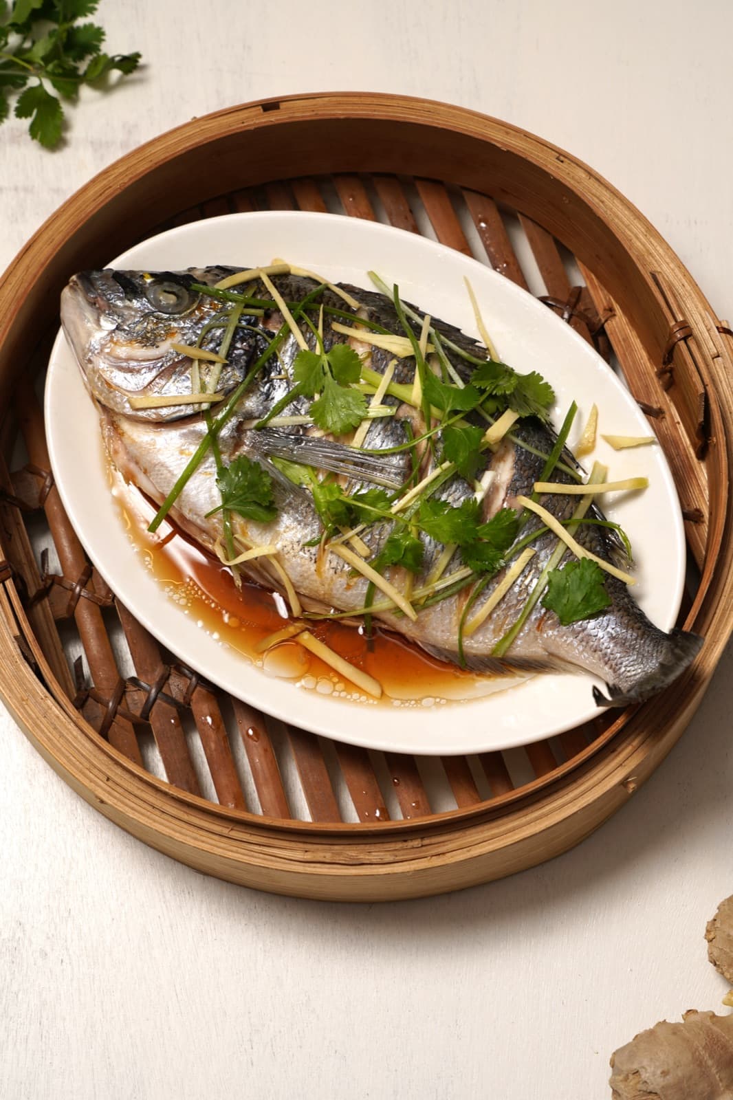 Gestoomde vis in bamboestomer - traditioneel Hakka gerecht